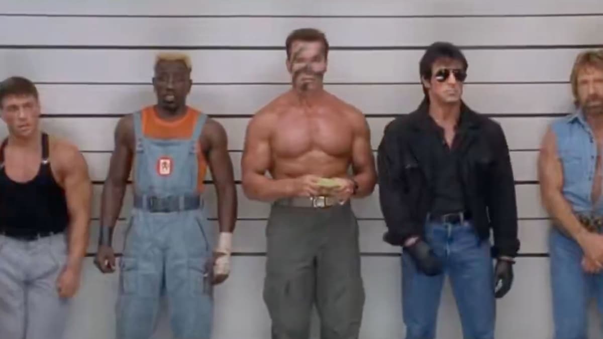 AI-generated recreation of the Usual Suspects police lineup: Jean-Claude Van Damme in a black tank top, Wesley Snipes with bleached hair in orange shirt and denim overalls, a shirtless Arnold Schwarzenegger with camo face paint, Sylvester Stallone in aviators and a black jacket, and Chuck Norris in a sleeveless denim vest, standing against a white height-chart wall